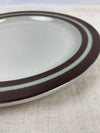 Large Round Chop Plate / Serving Platter, neutral oatmeal coloured plate with Brown Striped Bands. Marked Arabia Finland Karelia as shown. Designed by Anja Jaatinen-Winquist in the 1960's. 