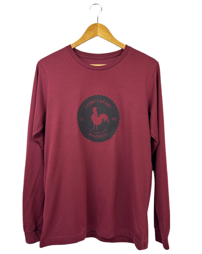cardinal red heather long sleeve with black rooster badge county brand design prince edward county t-shirt