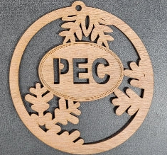pec oval wood laser cut ornament with snowflake and branch motif