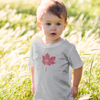 toddler wearing made in canada t-shirt with maple leaf home design canadian pride