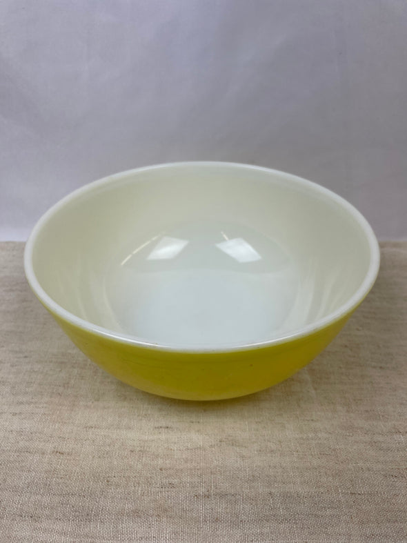 Yellow PYREX 404 25 1940's 4qt Bowl. 4.5" x 10.5" Used - marks on exterior of bowl 