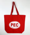 pec oval on red canvas tote prince edward county