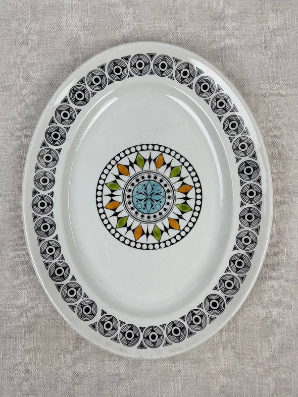 Kathie Winkle Oval Serving Platter in Roulette Pattern  Size: 12" x 9.5" Gently Used with some normal wear