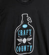 close up of beer growler craft county brewery pec prince edward county t-shirt on black