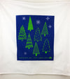 county brand flour sack tea towel with holiday christmas trees in green and blue background