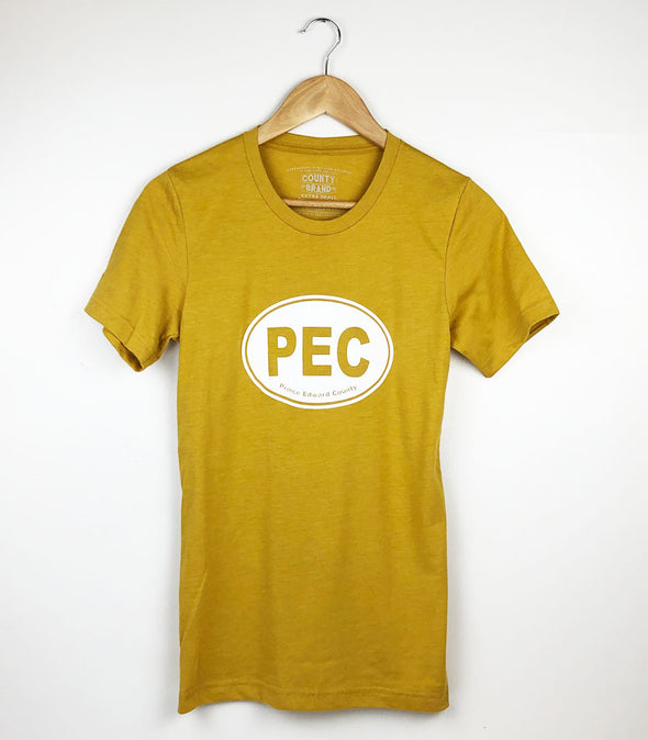white PEC oval on mustard yellow gold heather unisex t-shirt prince edward county