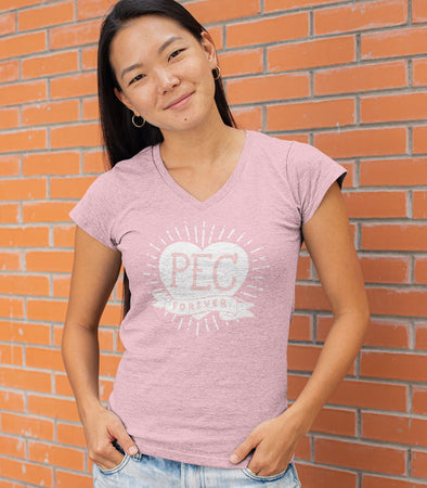 young woman wearing a pec forever heart design on light pink vneckt-shirt 