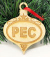 wood globe christmas ornament with PEC oval prince edward county